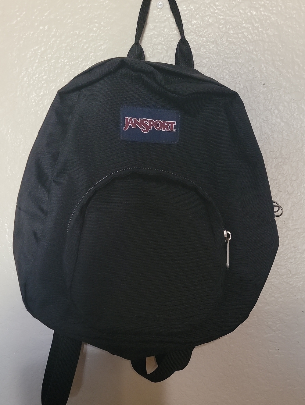 Jansport Black Backpack with Red Logo Patch